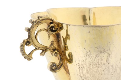 Lot 233 - An early 17th century German silver gilt twin handled cup, Augsburg 1625-1630 by David Roll (master 1605, d. between 1638-43)
