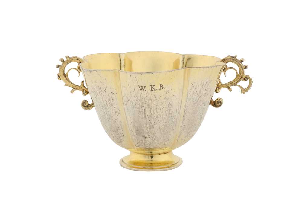 Lot 233 - An early 17th century German silver gilt twin handled cup, Augsburg 1625-1630 by David Roll (master 1605, d. between 1638-43)