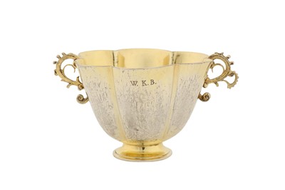 Lot 247 - An early 17th century German silver gilt twin handled cup, Augsburg 1625-1630 by David Roll (master 1605, d. between 1638-43)