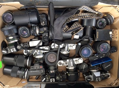 Lot 1003 - A Box of Olympus OM Film Cameras & Lenses.