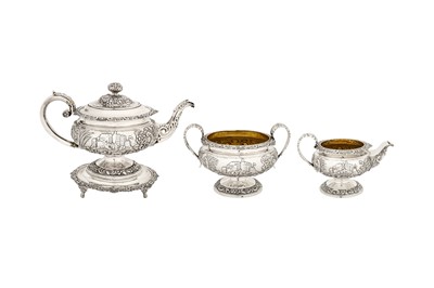 Lot 392 - A George III/IV Scottish sterling silver ‘castle top’ four-piece tea service, Edinburgh 1817/20 by J Hay, the stand by James McKay