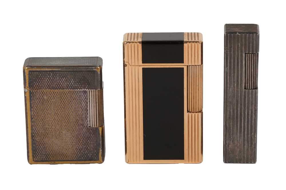 Lot 135 - A GOLD PLATED DUPONT LIGHTER, A SILVER PLATED DUPONT LIGHTER AND A SILVER MARUMAN LIGHTER