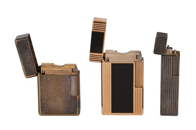Lot 135 - A GOLD PLATED DUPONT LIGHTER, A SILVER PLATED DUPONT LIGHTER AND A SILVER MARUMAN LIGHTER