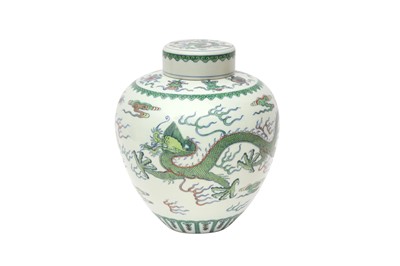 Lot 975 - A CHINESE WUCAI 'DRAGON' JAR AND COVER