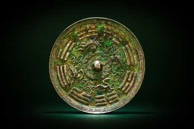 Lot 492 - A CHINESE SILVERED BRONZE 'EIGHT TRIGRAMS' MIRROR