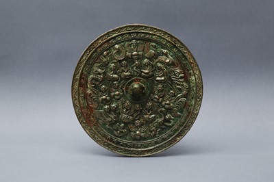 Lot 486 - A CHINESE BRONZE 'IMMORTALS' MIRROR