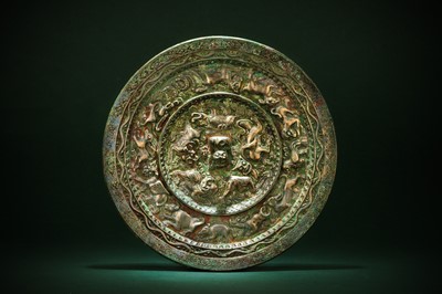 Lot 234 - A CHINESE SILVERED BRONZE 'ZODIAC' MIRROR