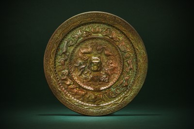 Lot 226 - A CHINESE BRONZE 'ZODIAC' MIRROR