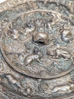 Lot 221 - A CHINESE SILVERED BRONZE 'LION AND GRAPEVINE' MIRROR