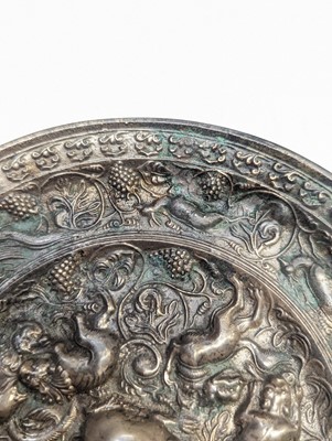 Lot 221 - A CHINESE SILVERED BRONZE 'LION AND GRAPEVINE' MIRROR