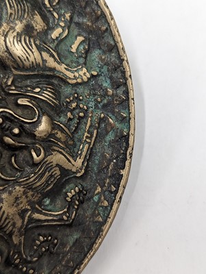 Lot 252 - A SMALL CHINESE BRONZE 'LION' MIRROR