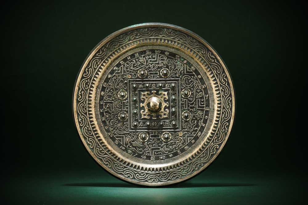 Lot 263 - A CHINESE BRONZE 'TLV' MIRROR