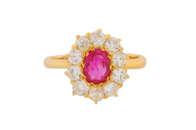 Lot 57 - A RUBY AND DIAMOND CLUSTER RING