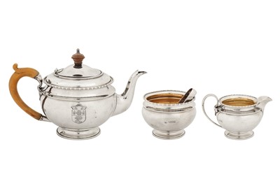 Lot 319 - A George V sterling silver three-piece tea service, London 1914 by Robert Pringle and Sons
