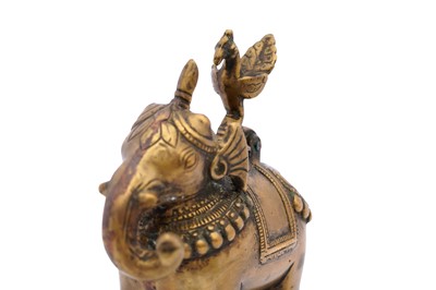 Lot 111 - AN INDIAN BRASS ELEPHANT-SHAPED CONTAINER
