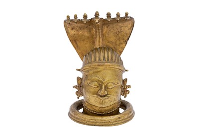 Lot 139 - A LARGE CAST BRASS SHIVA LINGAM COVER WITH NAGAS