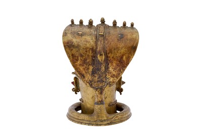 Lot 139 - A LARGE CAST BRASS SHIVA LINGAM COVER WITH NAGAS