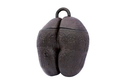 Lot 263 - A CARVED COCO-DE-MER (LODOICEA MALDIVICA) WITH FIGURAL MOTIFS