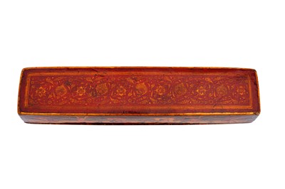 Lot 333 - A QAJAR LACQUERED PAPIER-MÂCHÉ SQUARED PEN CASE (QALAMDAN) WITH MOHAMMAD SHAH QAJAR (1808 - 1848)
