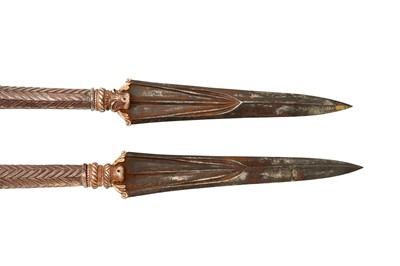 Lot 219 - AN IMPRESSIVE PAIR OF SILVER-MOUNTED WOODEN TEMPLE GUARDIANS (DVARAPALAS) SPEARS