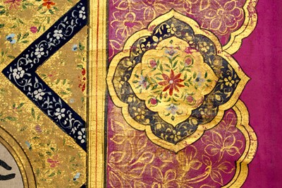 Lot 240 - A LARGE MUSLIM INDIAN PRAYER COTTON BANNER WITH IMAM 'ALI'S QUALITIES AND RELIGIOUS INVOCATIONS