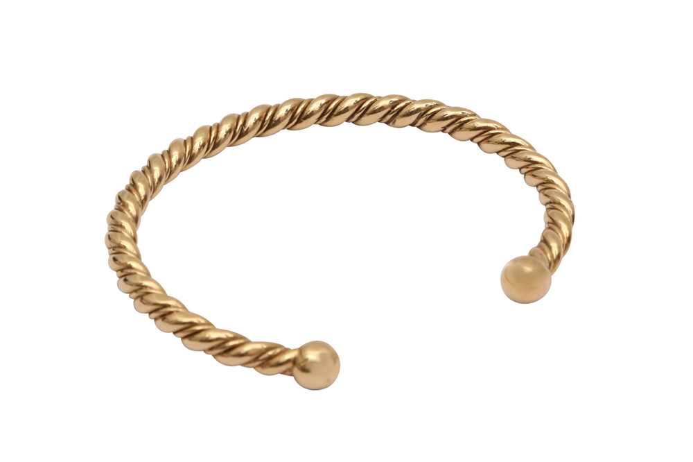 Lot 100 - 9CT GOLD TWO-BALL ROPE BANGLE, CIRCA 1956