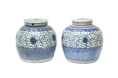 Lot 320 - A PAIR OF CHINESE BLUE AND WHITE JARS AND COVERS