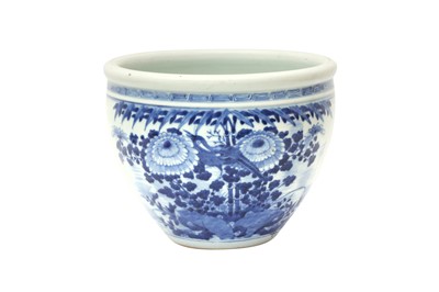 Lot 535 - A CHINESE BLUE AND WHITE 'BIRD AND BLOSSOMS' JARDINIÈRE