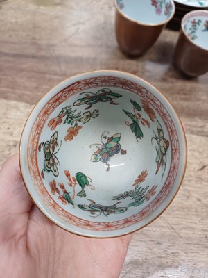 Lot 14 - THREE CHINESE BATAVIAN WARE CUPS AND FOUR SAUCERS