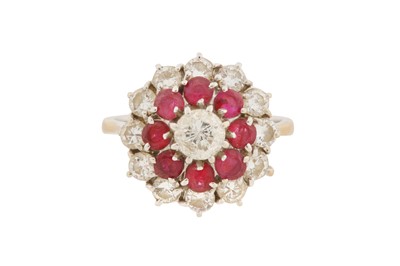 Lot 37 - A DIAMOND AND RUBY CLUSTER RING