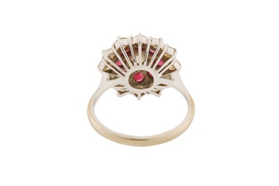 Lot 37 - A DIAMOND AND RUBY CLUSTER RING