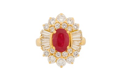 Lot 65 - A RUBY AND DIAMOND CLUSTER RING
