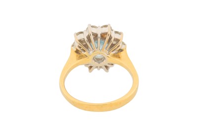 Lot 205 - AN AQUAMARINE AND DIAMOND CLUSTER RING