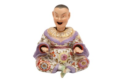 Lot 215 - A MEISSEN STYLE GERMAN PORCELAIN NODDING CHINESE SEATED FIGURE, 19TH CENTURY