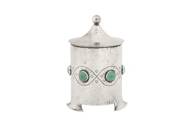 Lot 257 - An Edwardian ‘Arts and Crafts’ sterling silver tea caddy, Birmingham 1903 by Albert Edward Jones