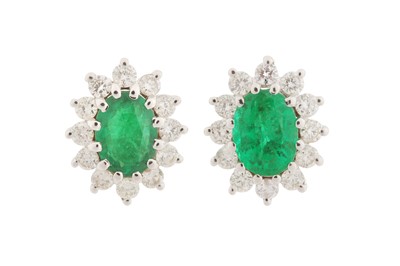 Lot 128 - A PAIR OF EMERALD AND DIAMOND STUDS