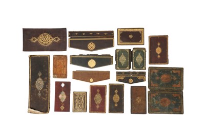 Lot 244 - SIXTEEN ISLAMIC TOOLED AND GILT LEATHER BOOK COVERS