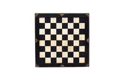Lot 421 - λ A FINE EBONY AND IVORY-INLAID GAMING BOARD