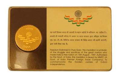 Lot 128 - A 24CT GOLD INDIAN COIN