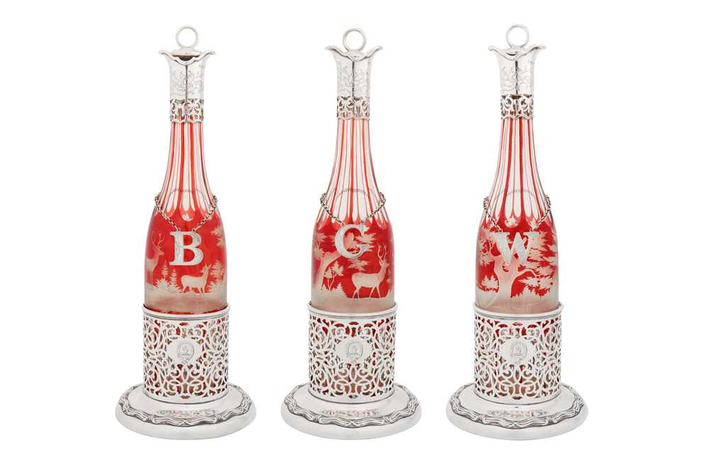 A good set of three Victorian sterling silver mounted cased ruby glass...