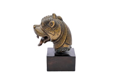 Lot 247 - A SINHA (LION) HEAD BRONZE FINIAL