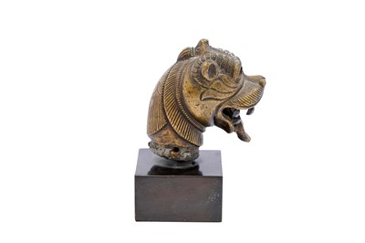 Lot 247 - A SINHA (LION) HEAD BRONZE FINIAL