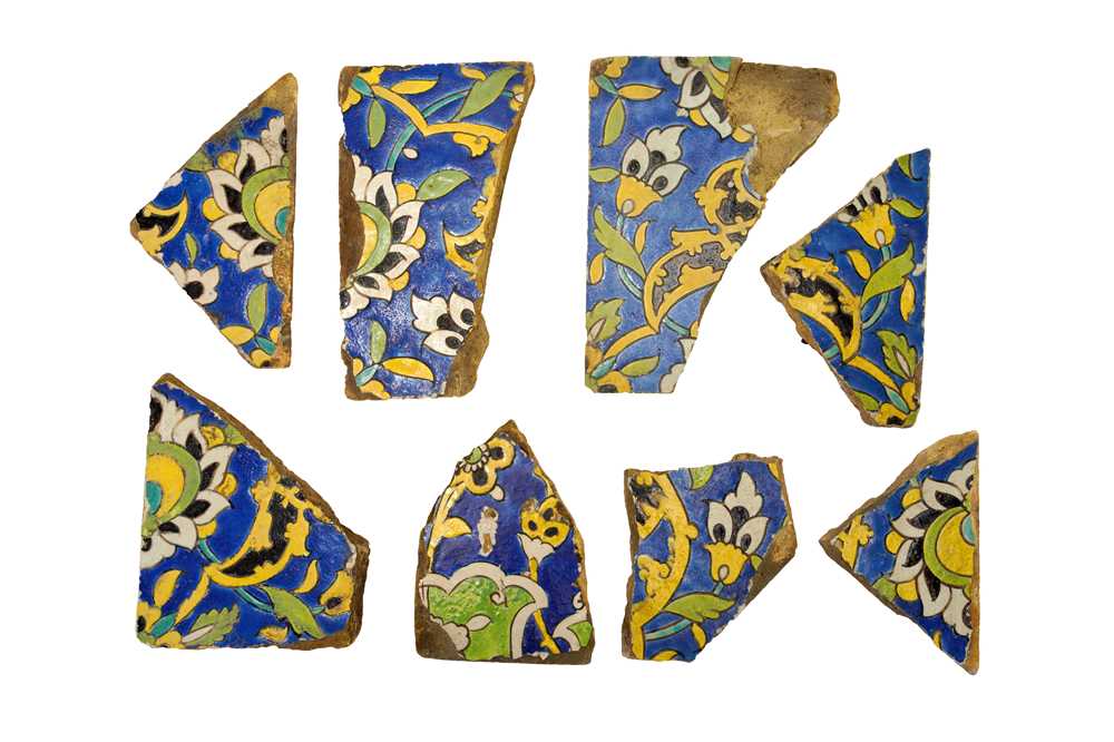 Lot 288 - EIGHT FRAGMENTS OF SAFAVID CUERDA SECA POTTERY TILES