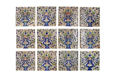 Lot 294 - EIGHTEEN QAJAR POLYCHROME-PAINTED DECORATIVE ARCHITECTURAL POTTERY TILES