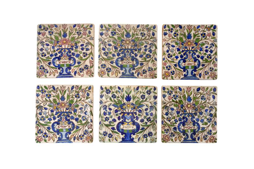 Lot 294 - EIGHTEEN QAJAR POLYCHROME-PAINTED DECORATIVE ARCHITECTURAL POTTERY TILES