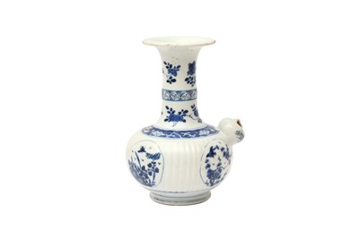 Lot 68 - A CHINESE BLUE AND WHITE KENDI