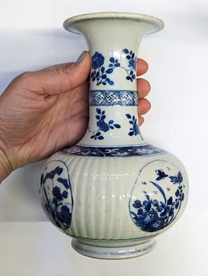 Lot 68 - A CHINESE BLUE AND WHITE KENDI