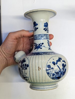 Lot 68 - A CHINESE BLUE AND WHITE KENDI