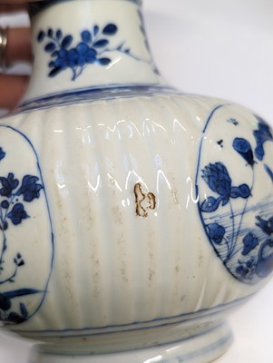 Lot 68 - A CHINESE BLUE AND WHITE KENDI