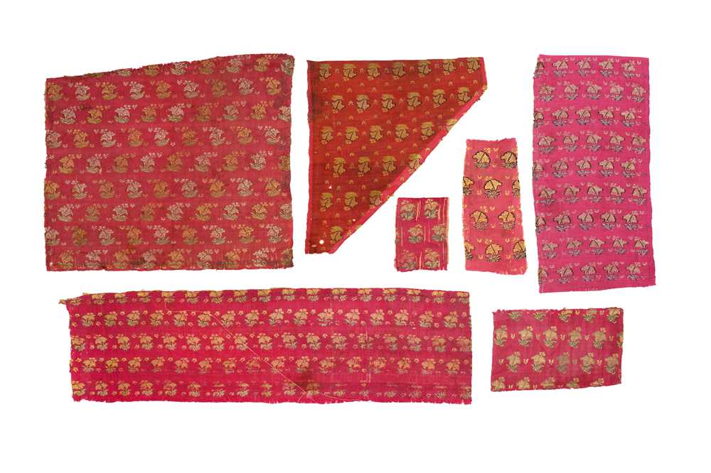Lot 255 - SEVEN SATIN SILK FRAGMENTS WITH FLORAL MOTIF